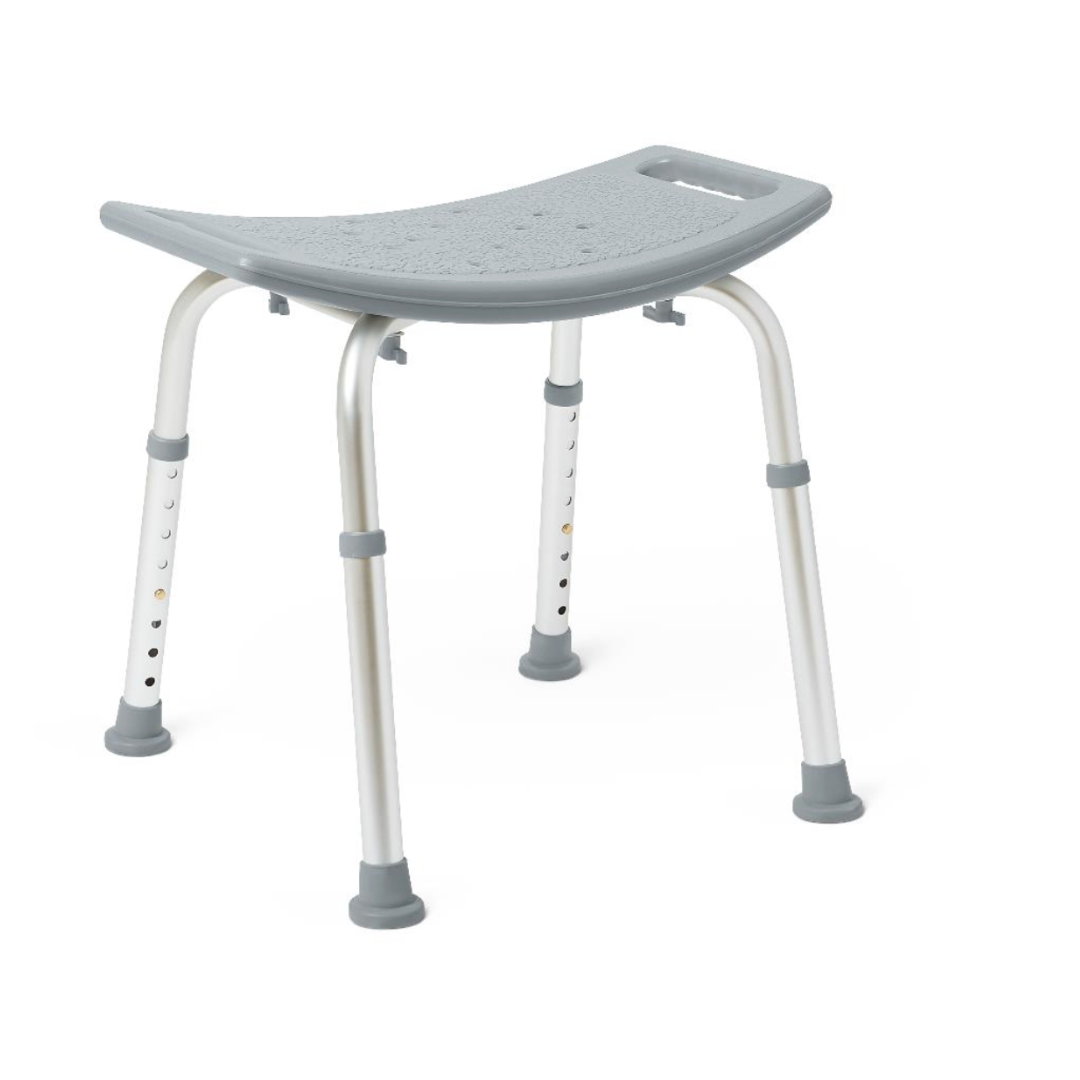 The Medline Shower Chair with Suction Grip Feet features a curved plastic seat, adjustable aluminum legs, slip-resistant rubber tips, and drainage holes. It includes a built-in handle for easy portability and offers Microban antimicrobial protection for peace of mind.